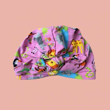 Bonnet enfant à petit noeud rose animaux de la jungle