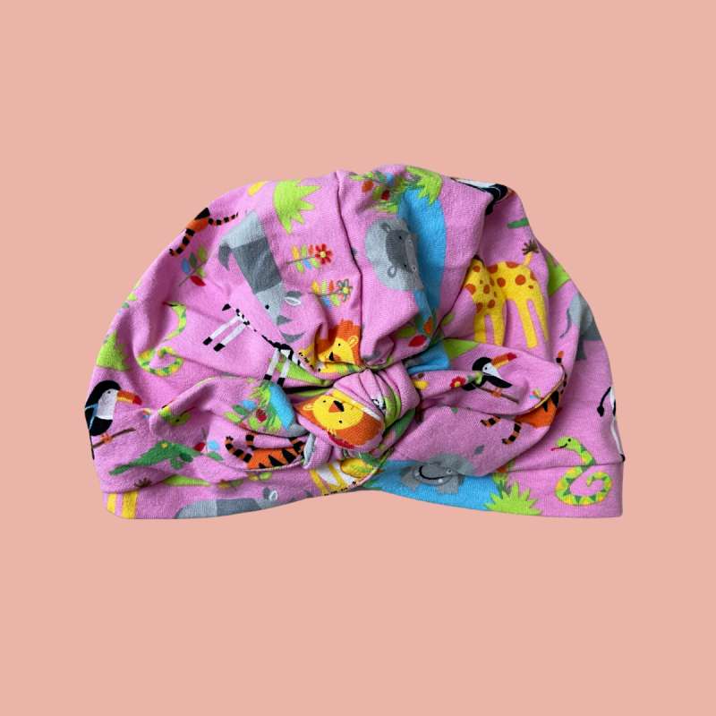 Bonnet enfant à petit noeud rose animaux de la jungle